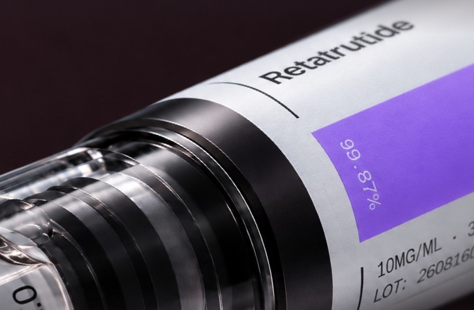 Close-up of a Retatrutide research pen label showing its batch purity